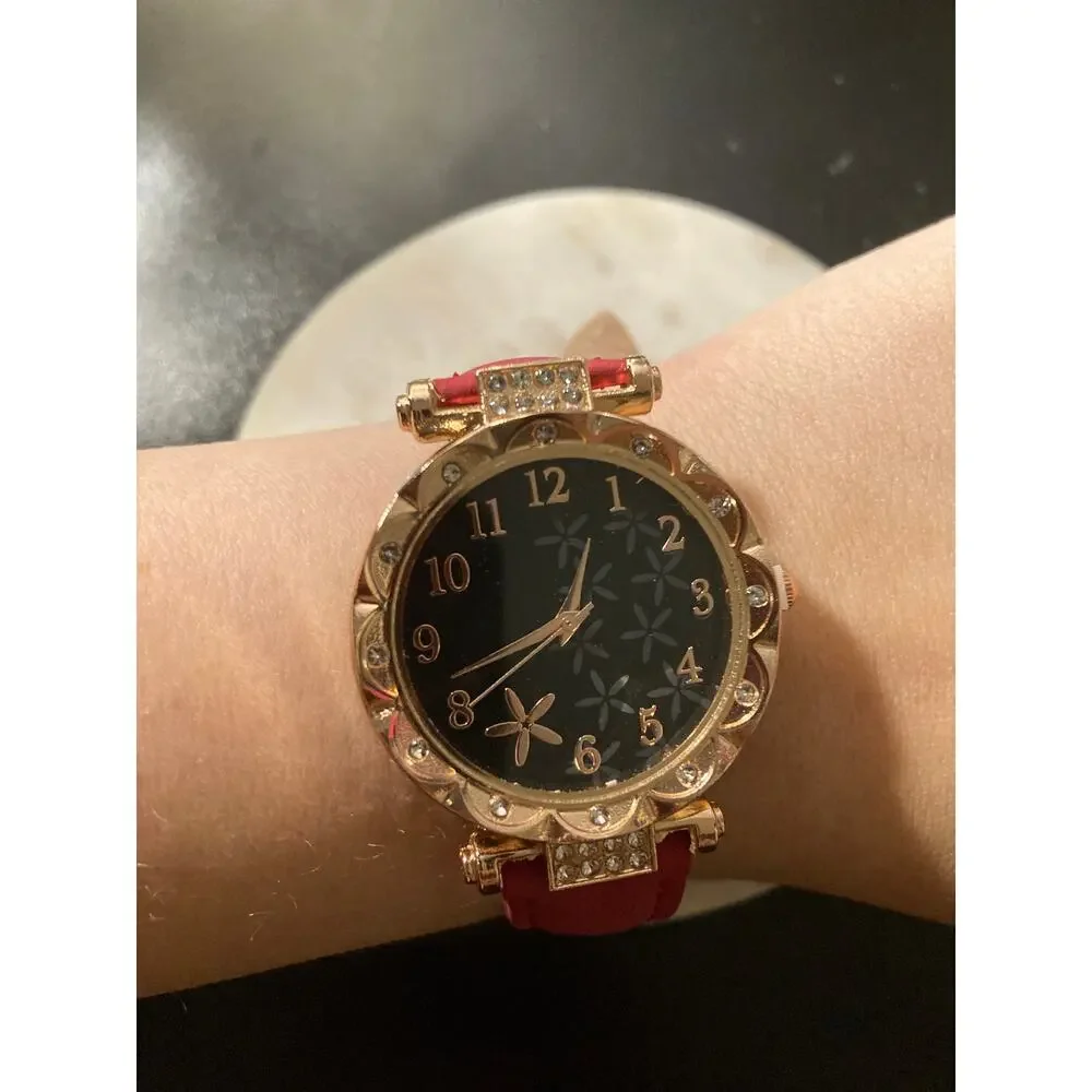 Women’s wrist watch red band golden , bling detail